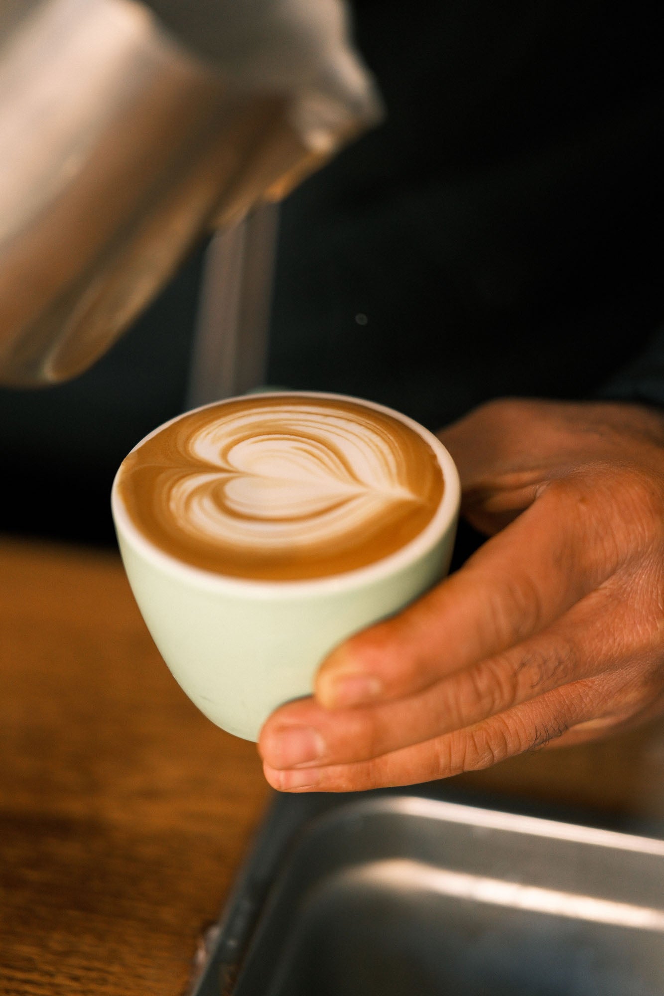 Latte art pouring Cafe Dougie Surry Hills